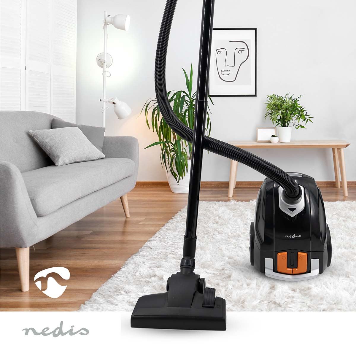 Nedis Vacuum Cleaner | With Bag | 700 W | Dust capacity: 2.0 l | Combi Brush | Action radius: 7.50 m | Hepa 12 | Black / Orange